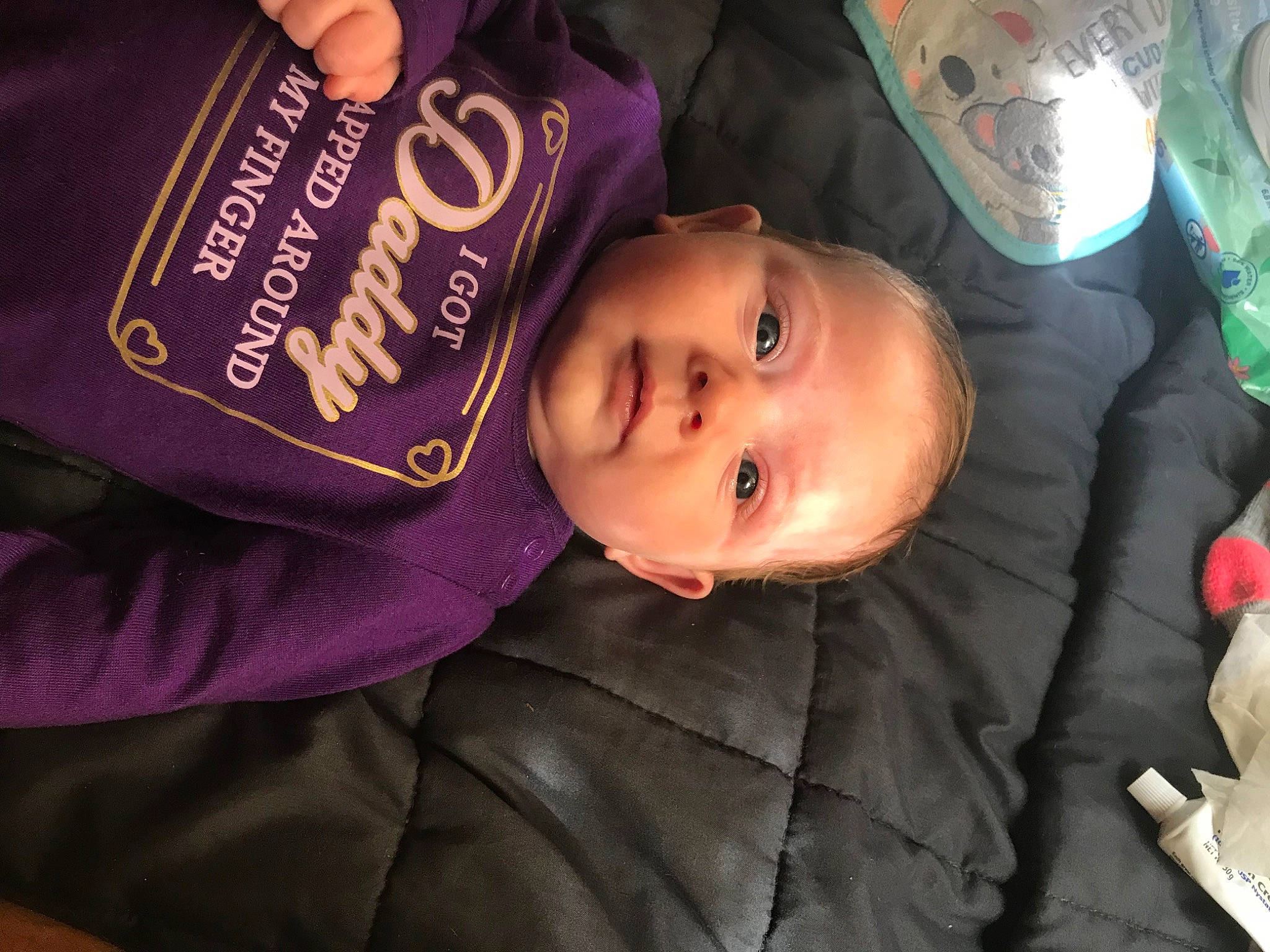 Alaska joined the competition — help win amazing prizes! baby, book, cheek, child, clothing, eyelash, fun, fur, happy, hat, iris, magenta, outerwear, person, pink, purple, skin, sleeve, smile, toddler