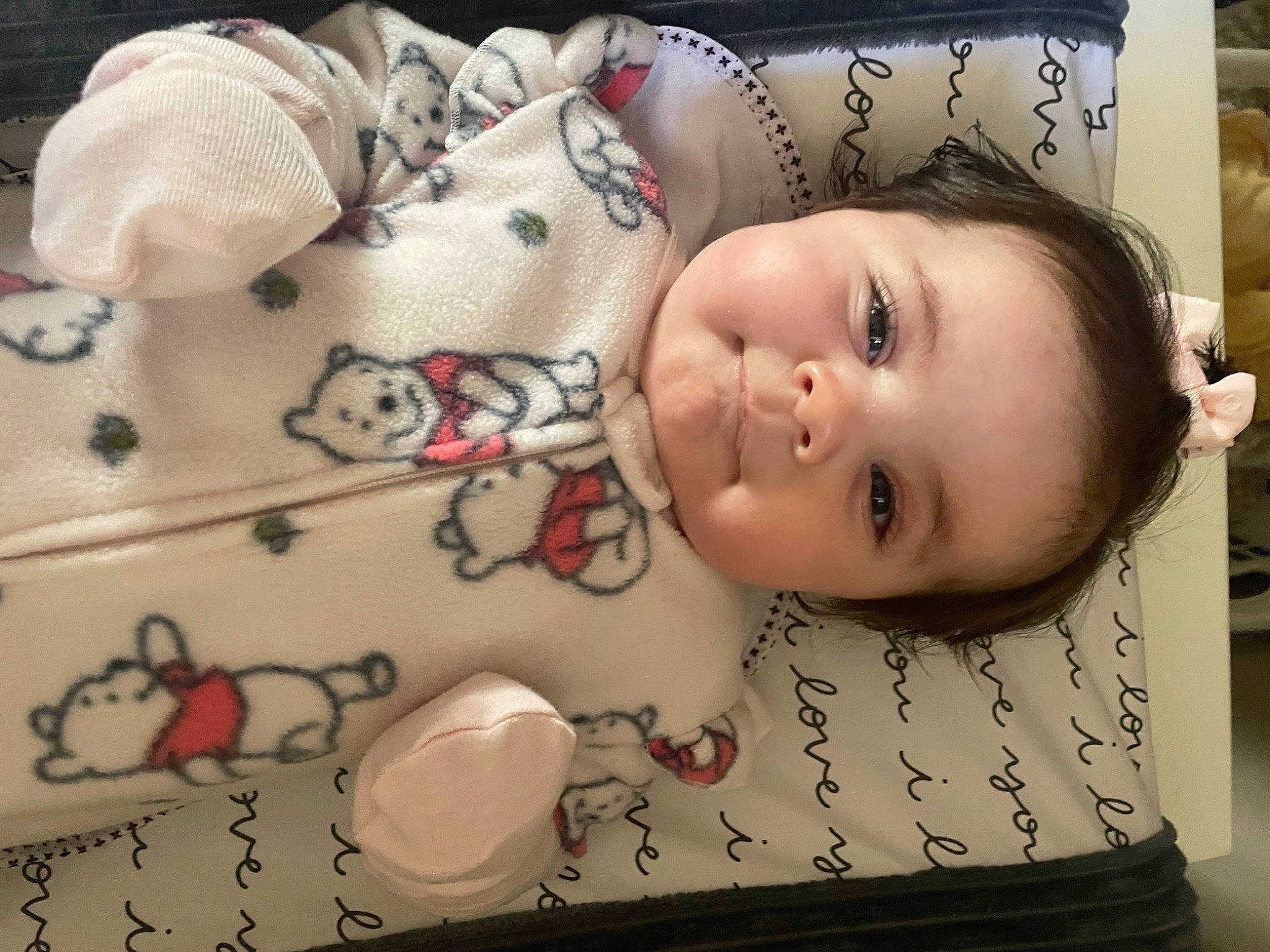 Serena is registered to the contest to win money with this photo: baby, baby_toddler_clothing, cheek, chin, eye, eyelash, flooring, head, headgear, human_body, iris, lip, mouth, nose, person, skin, sleeve, textile, toddler, white