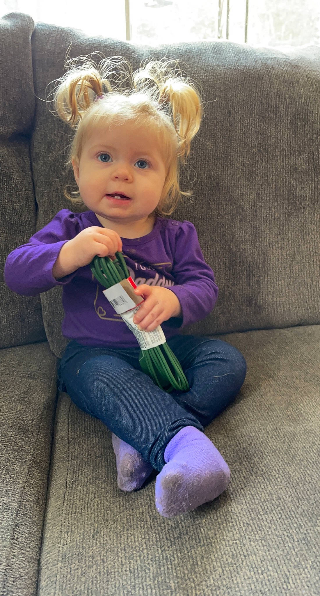 Presleigh joined the competition — help win amazing prizes! baby_toddler_clothing, bottle, cheek, child, comfort, finger, hair, hairstyle, happy, human_body, iris, jeans, lap, leg, person, purple, sitting, skin, smile, thumb