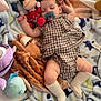 baby, sleeping, pacifier, stuffed_animal, minnie_mouse, blanket, playpen, plush, child, cozy, socks, dress, infant, soft_toys, resting, cute, indoor, comfort, peaceful, nap