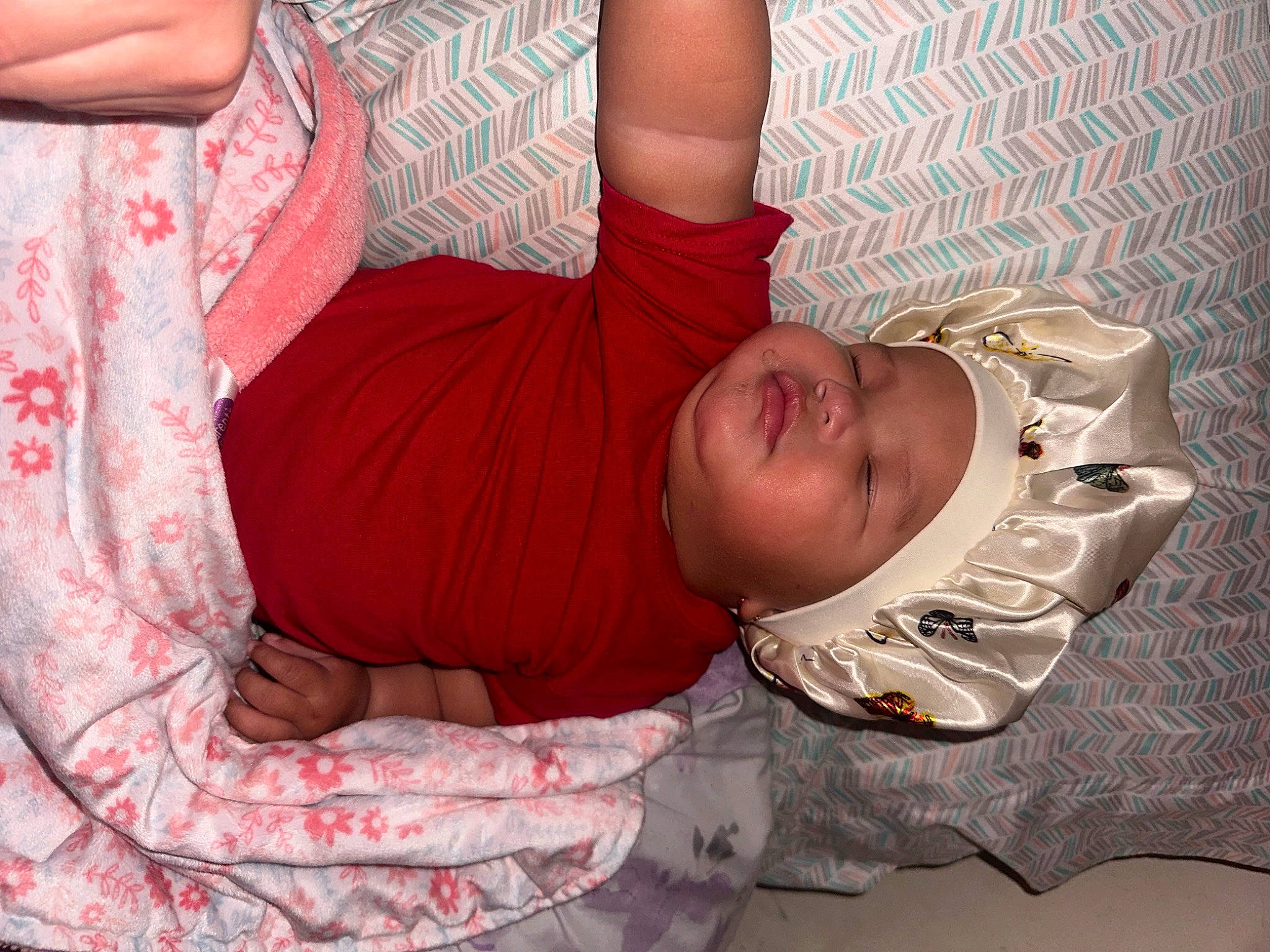 Nevaeh joined the competition — help win amazing prizes! abdomen, baby, baby_toddler_clothing, chest, child, comfort, couch, elbow, fun, happy, headwear, human_leg, linens, magenta, mouth, pattern, person, room, skin, sleeve