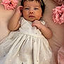 Emma joined the competition — help win amazing prizes! adorable, baby, baby_girl, child, clothing, cushion, cute, dress, face, flower, headband, indoor, infant, lying_down, pink, portrait, rose, skin, soft, toddler