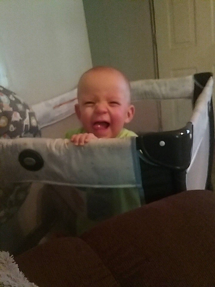 Hayden is registered to the contest to win money with this photo: baby, baby_products, chair, cheek, child, comfort, eye, face, facial_expression, furniture, head, infant_bed, nose, person, product, sitting, skin, smile, toddler