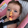 Madison is registered to the contest to win money with this photo: baby, child, blue_eyes, car_seat, pink, sunlight, face, portrait, infant, straps, seat_belt, clothing, cute, close_up, person, young_child, hair, skin, expression, safety