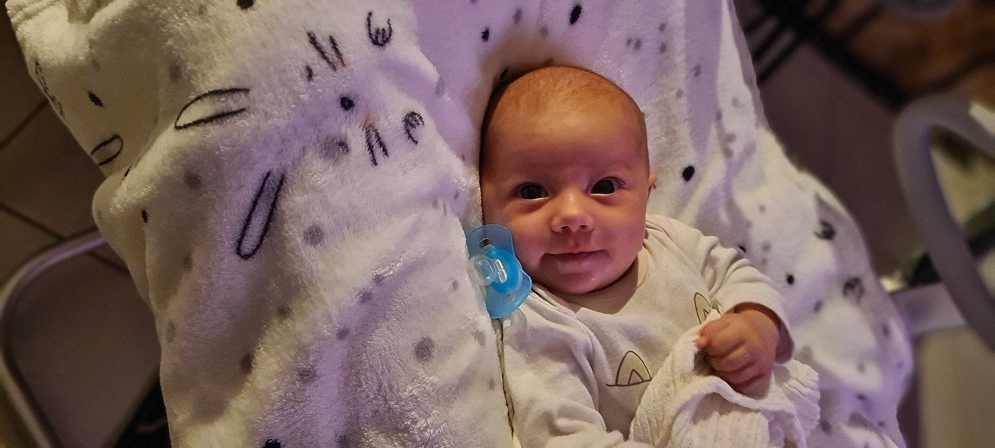 Liana participe au concours pour gagner de l'argent avec cette photo : baby, baby_toddler_clothing, cheek, child, chin, comfort, eye, eyebrow, face, happy, iris, nose, person, pink, product, purple, skin, smile, textile, toddler