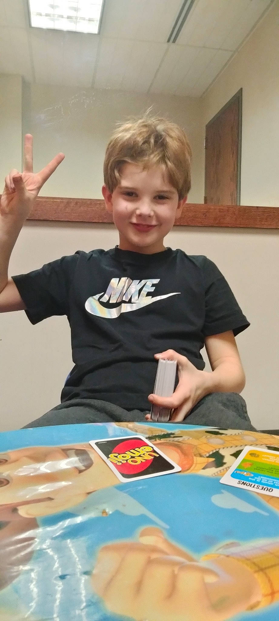 Hayden joined the competition — help win amazing prizes! child, engineering, finger, fun, gesture, hand, happy, indoor_games_and_sports, joy, learning, person, play, recreation, room, sharing, sign_language, sleeve, smile, t_shirt, table