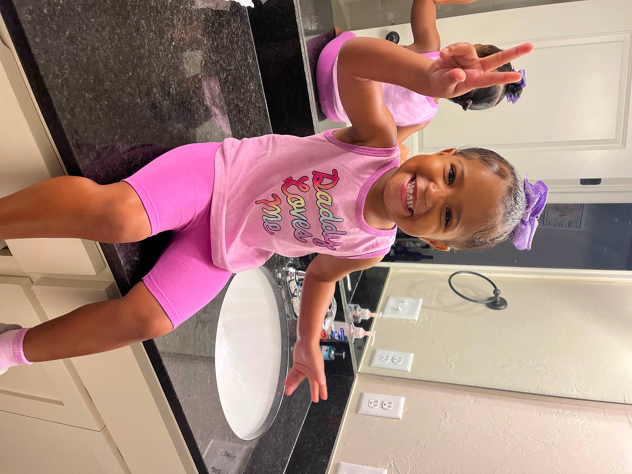 Alaysia is registered to the contest to win money with this photo: arm, cabinetry, elbow, finger, fun, human_leg, joint, joy, leg, magenta, material_property, muscle, person, pink, product, purple, shoulder, sleeve, smile, thigh