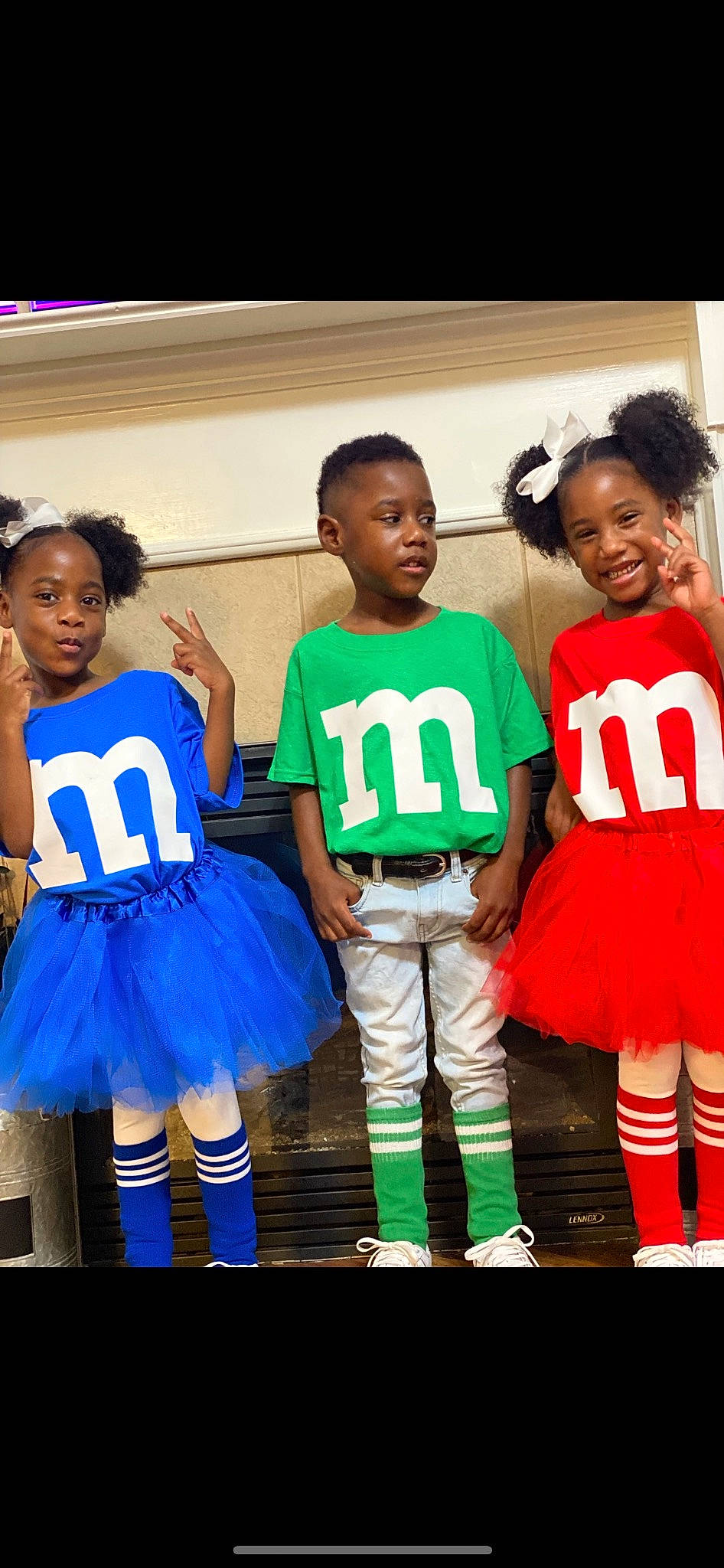 Triplets is registered to the contest to win money with this photo: child, electric_blue, fun, happy, jersey, joy, person, player, shoe, shorts, sleeve, sneakers, sock, sports_jersey, sports_uniform, sportswear, t_shirt, team, team_sport, thigh