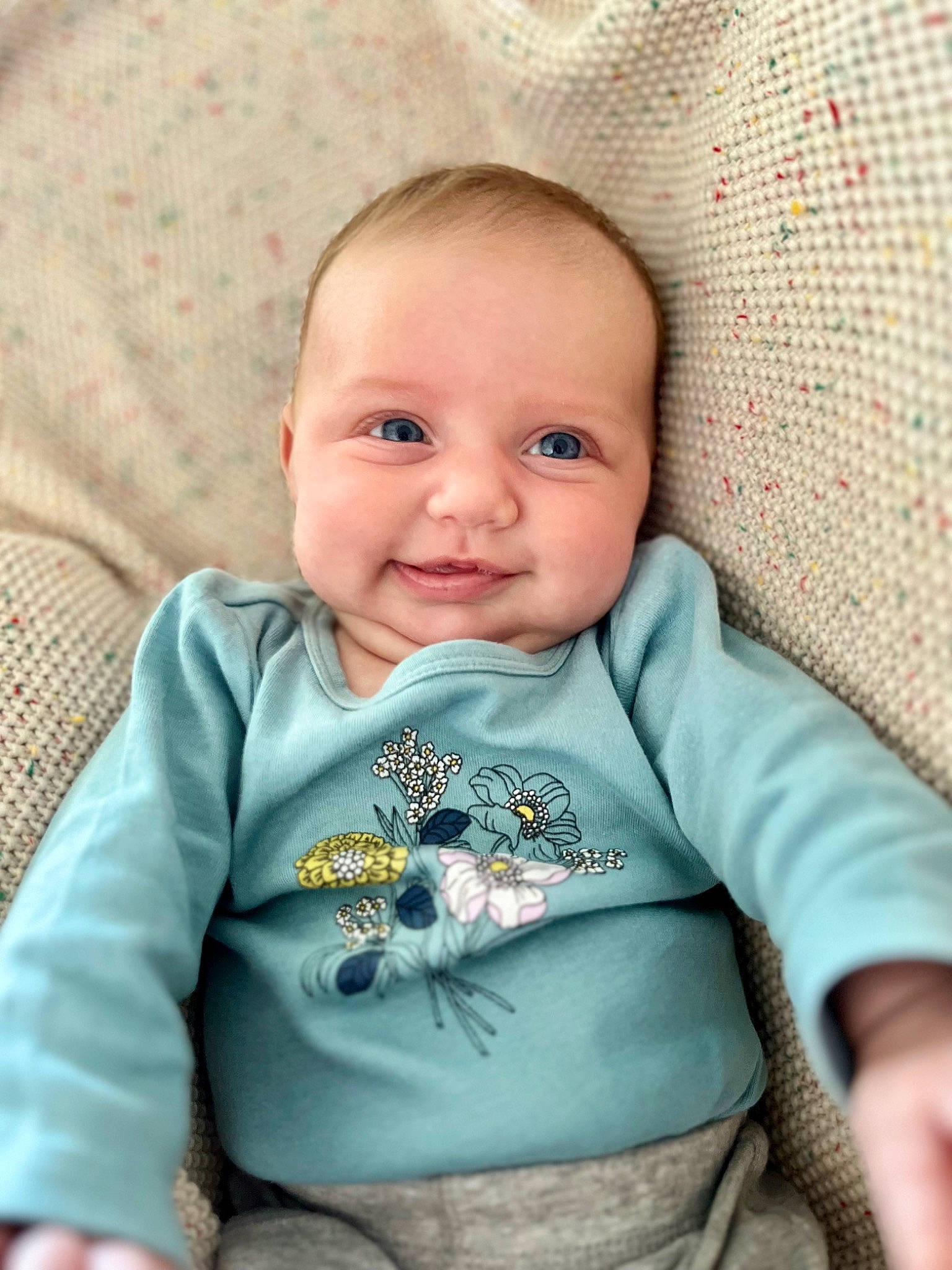Sage is registered to the contest to win money with this photo: baby, baby_products, baby_toddler_clothing, cheek, child, comfort, eye, happy, head, iris, joy, linens, nose, person, portrait_photography, sitting, skin, sleeve, smile, t_shirt
