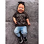 Billy-Ellen is registered to the contest to win money with this photo: baby, child, smiling, headband, bow, tshirt, led_zeppelin, jeans, sneakers, black_shoes, lying_down, gray_blanket, happy, cute, infant, portrait, casual_clothing, fashion, indoor, person