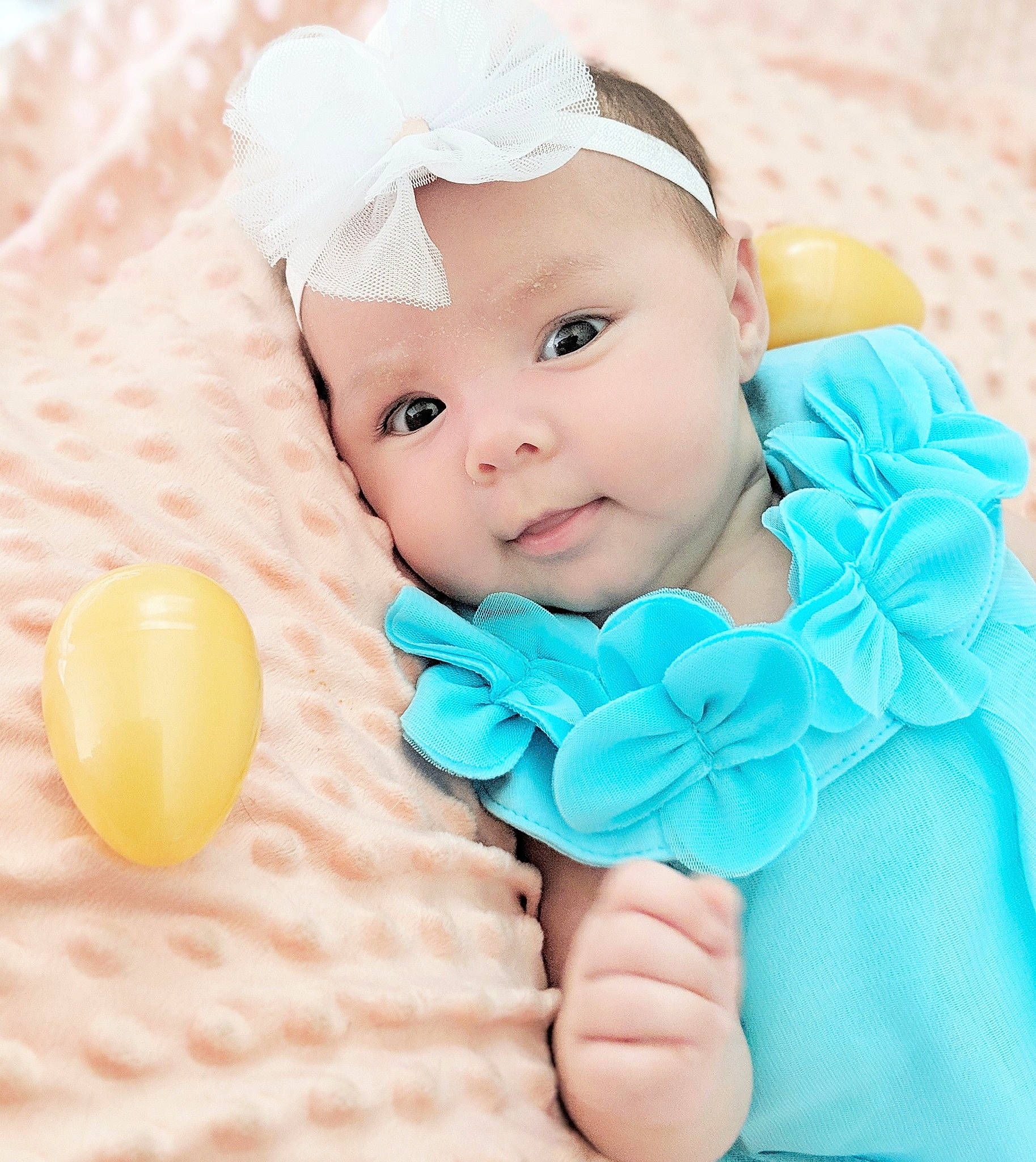 Devyn is registered to the contest to win money with this photo: baby, baby_toddler_clothing, beauty, child, child_model, fashion_accessory, hair_accessory, head, headband, headgear, person, pink, skin, toddler, turquoise, yellow