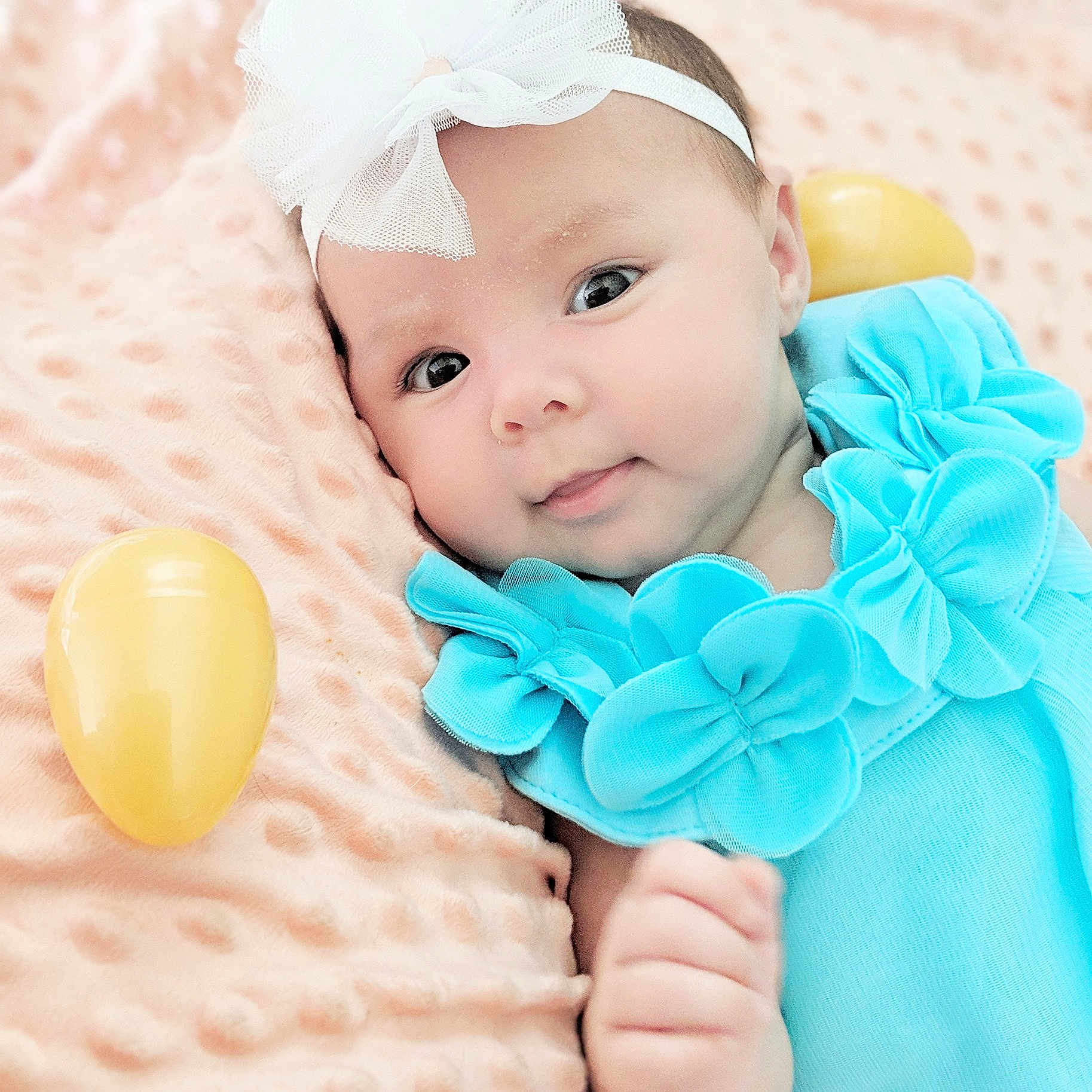 Devyn is registered to the contest to win money with this photo: baby, baby_toddler_clothing, beauty, child, child_model, fashion_accessory, hair_accessory, head, headband, headgear, person, pink, skin, toddler, turquoise, yellow