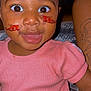 Tymaree Johnson is registered to the contest to win money with this photo: toddler, child, face, smile, pink_shirt, freckles, digital_art, fish, face_paint, indoor, person, happy, cute, closeup, young_child, skin, eyes, mouth, cheeks, sitting