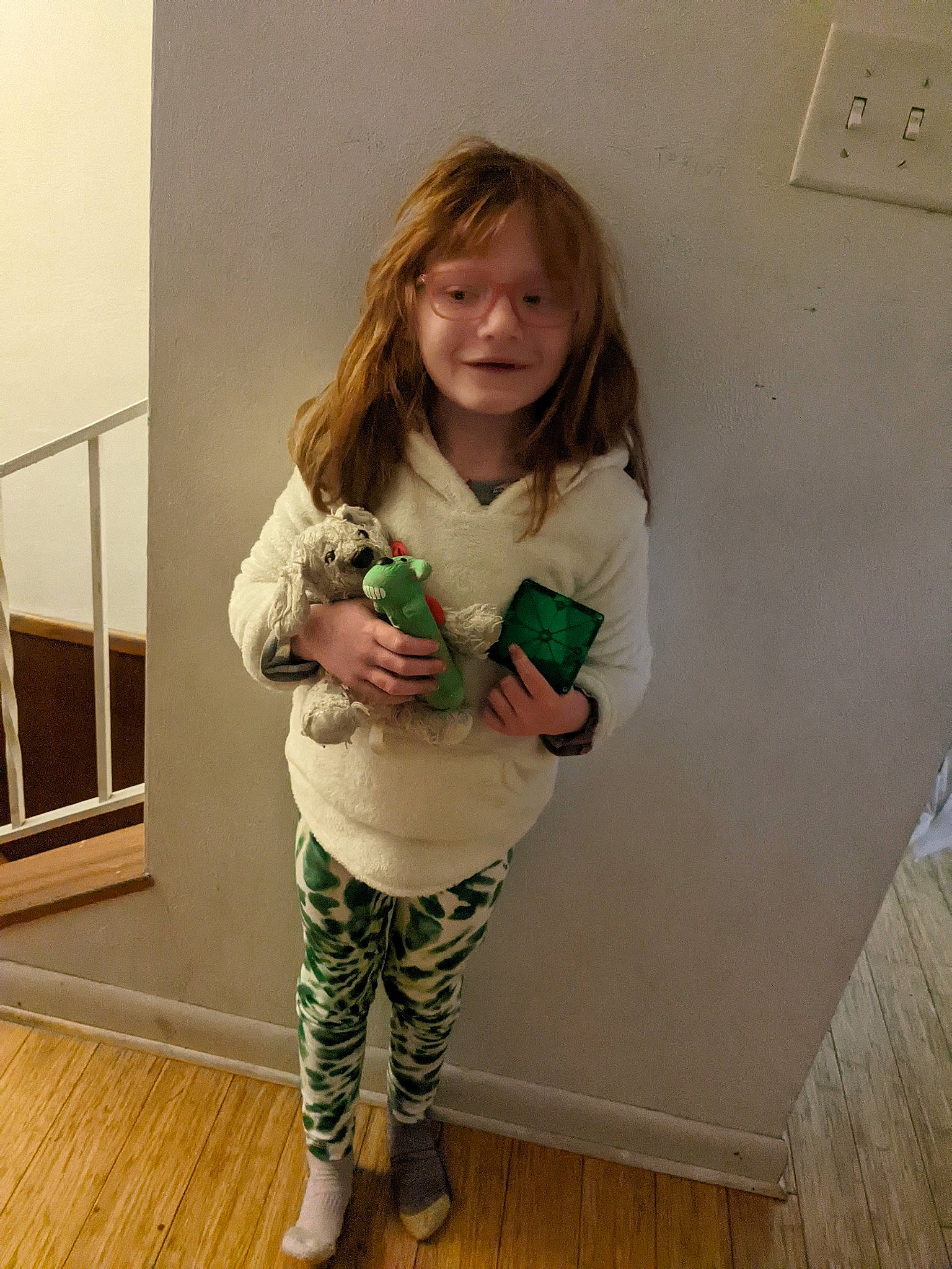 Taylor joined the competition — help win amazing prizes! baby_toddler_clothing, child, flooring, hairstyle, hardwood, human_leg, knee, leg, leggings, pattern, person, room, shorts, shoulder, sleeve, smile, sock, t_shirt, thigh, toddler