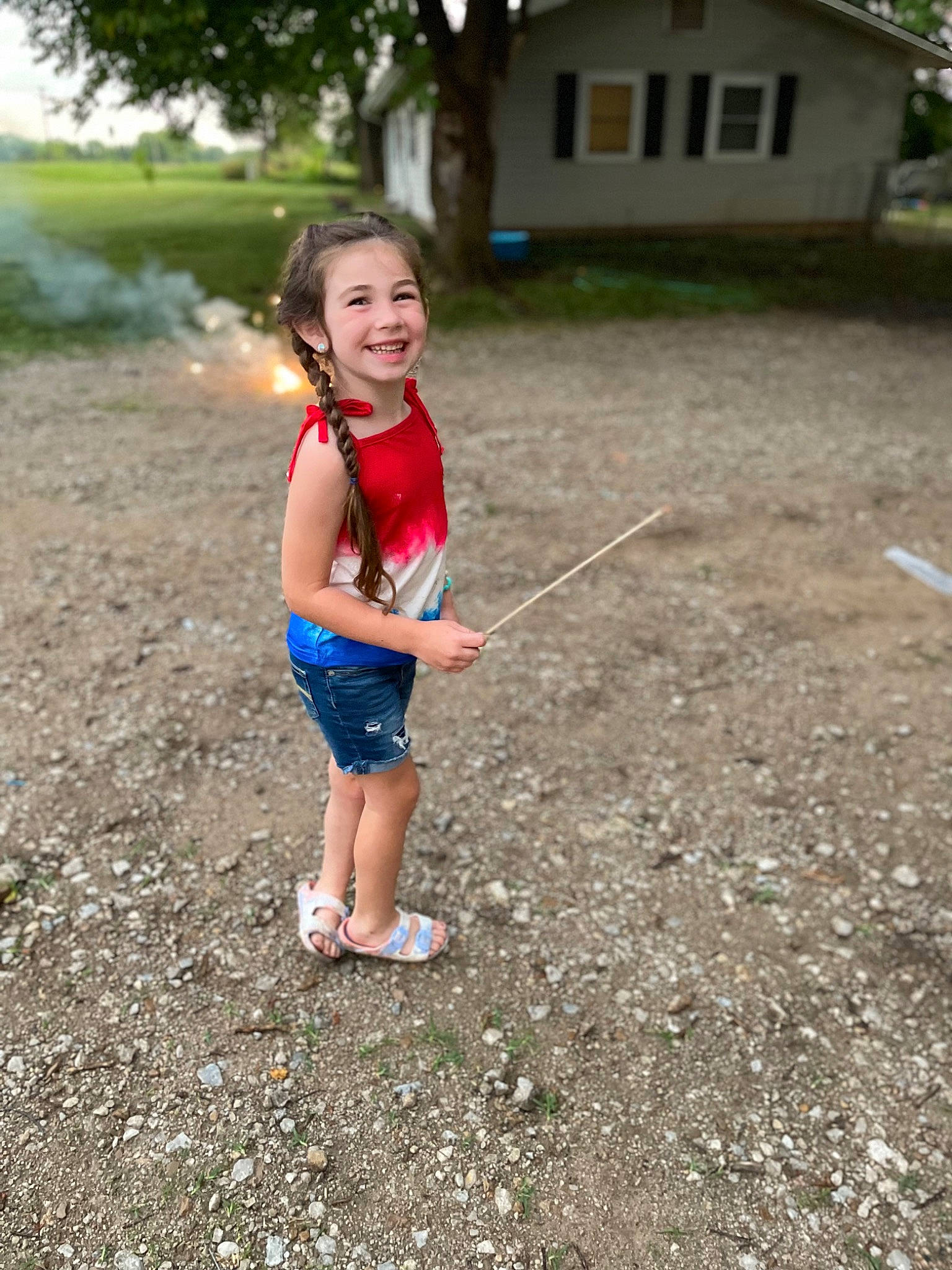 Berkley is registered to the contest to win money with this photo: asphalt, city, electric_blue, fun, grass, happy, joy, landscape, leg, leisure, people_in_nature, person, plant, recreation, road, road_surface, shorts, smile, soil, toddler