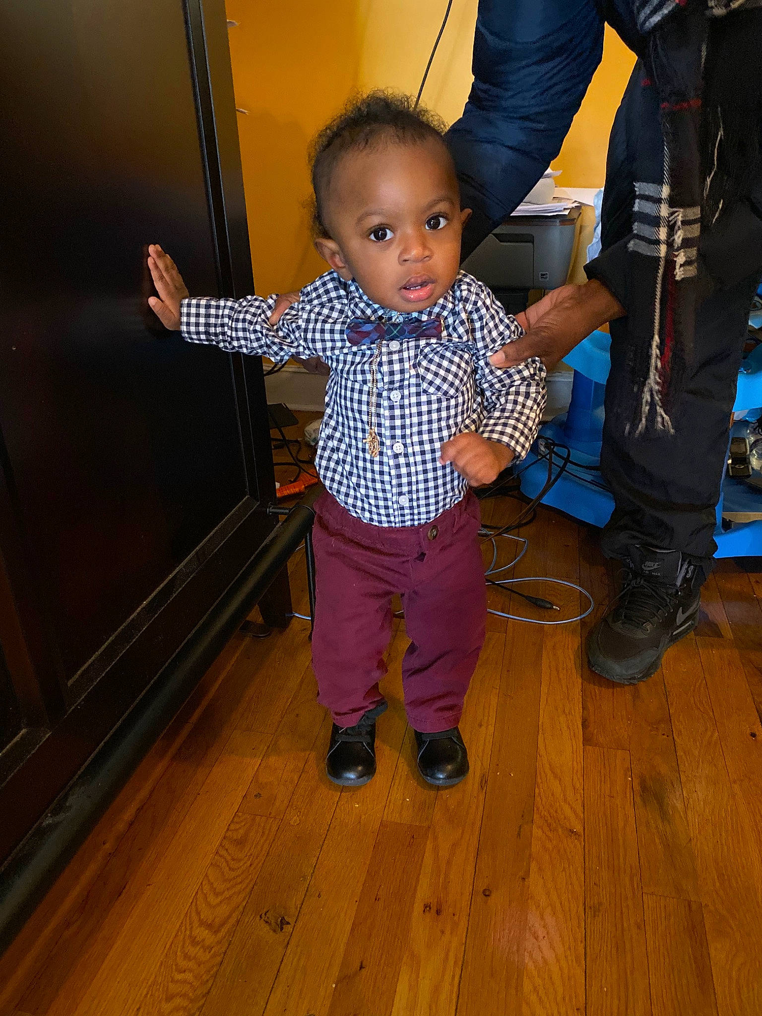 Yasin is registered to the contest to win money with this photo: child, floor, flooring, jeans, person, standing, toddler