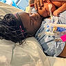 baby, bed, birth, blanket, caregiving, family, hospital, hospital_bed, indoors, infant, medical_equipment, medical_tubing, mother, newborn, parent, peaceful, portrait, recovery, skin_to_skin, sleeping