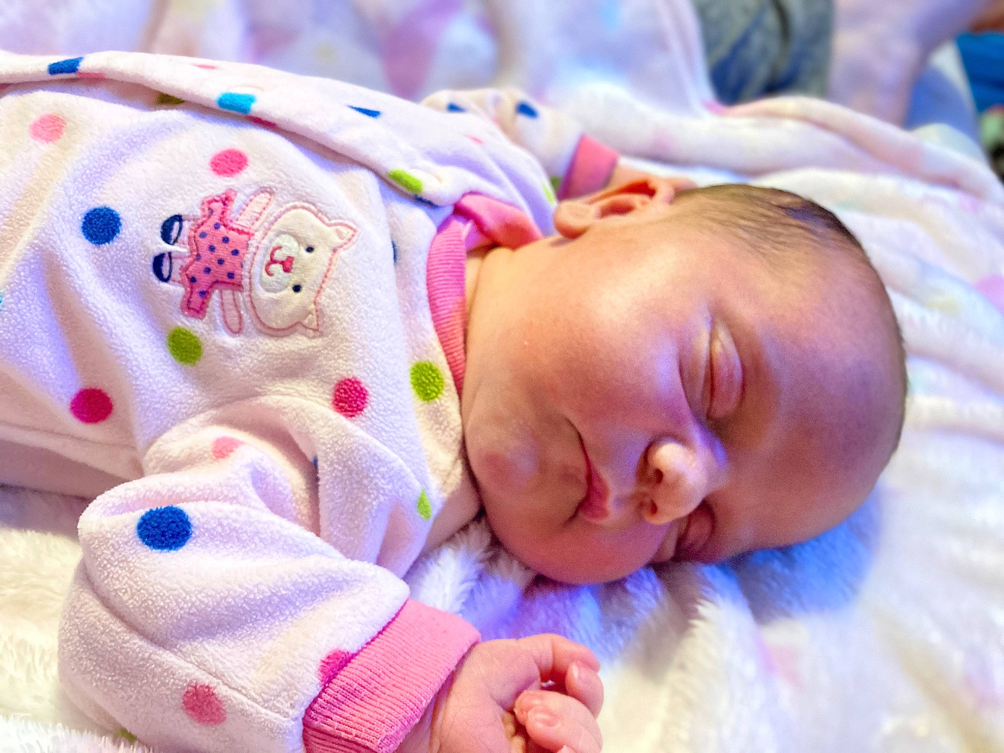 Amara is registered to the contest to win money with this photo: baby, baby_products, baby_sleeping, baby_toddler_clothing, bedtime, cheek, child, comfort, face, linens, magenta, nap, nose, pattern, person, pink, portrait_photography, skin, sleep, sleeve