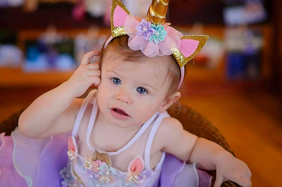 Maisie joined the competition — help win amazing prizes! baby, birthday, cheek, child, ear, fashion_accessory, hair_accessory, head, headband, headgear, headpiece, iris, person, photography, pink, skin, smile, toddler
