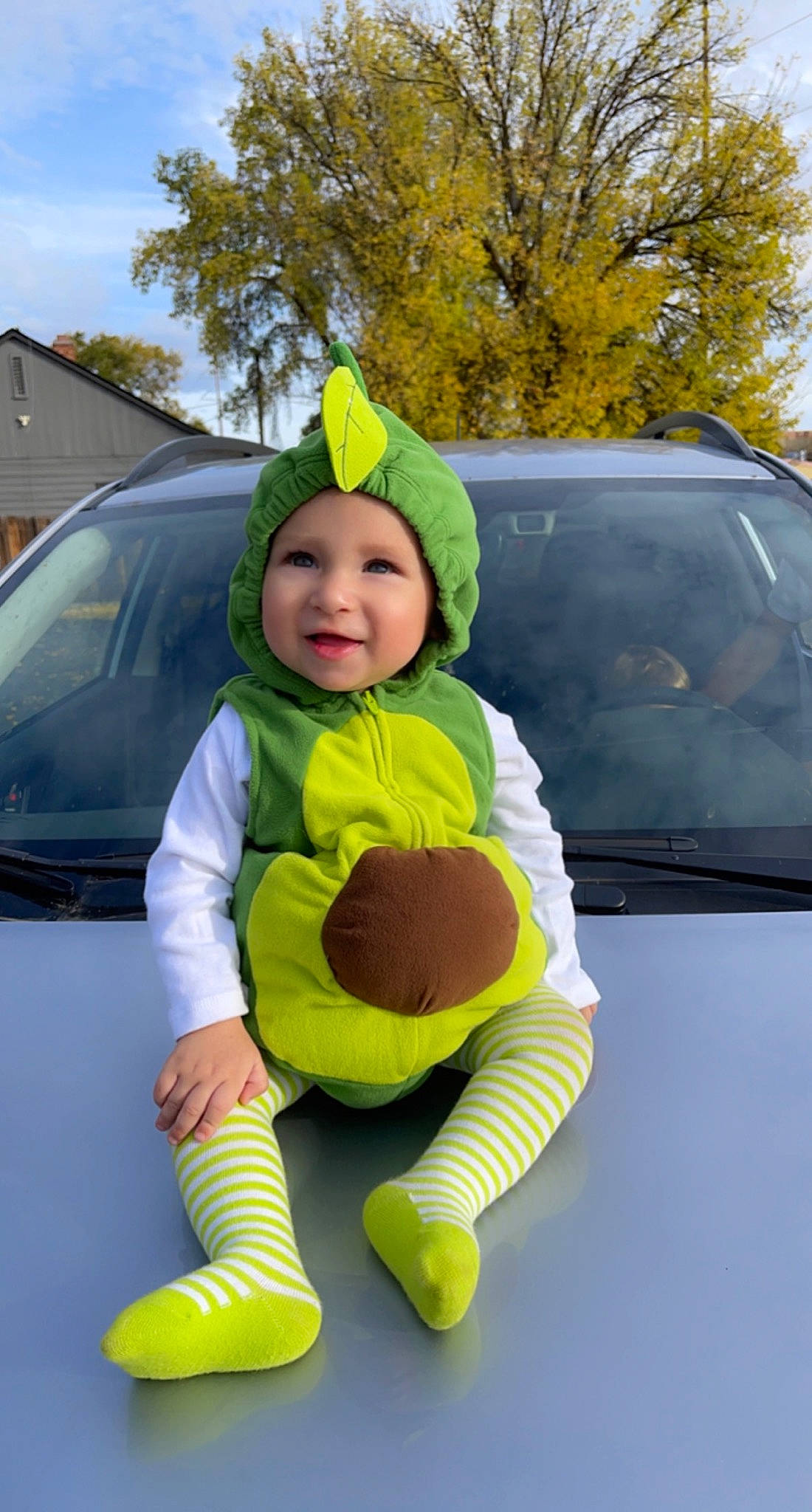 Omari joined the competition — help win amazing prizes! auto_part, automotive_exterior, automotive_lighting, cap, car, electric_blue, glove, grass, happy, headwear, hood, jacket, leisure, motor_vehicle, person, personal_protective_equipment, recreation, toddler, tree, vehicle