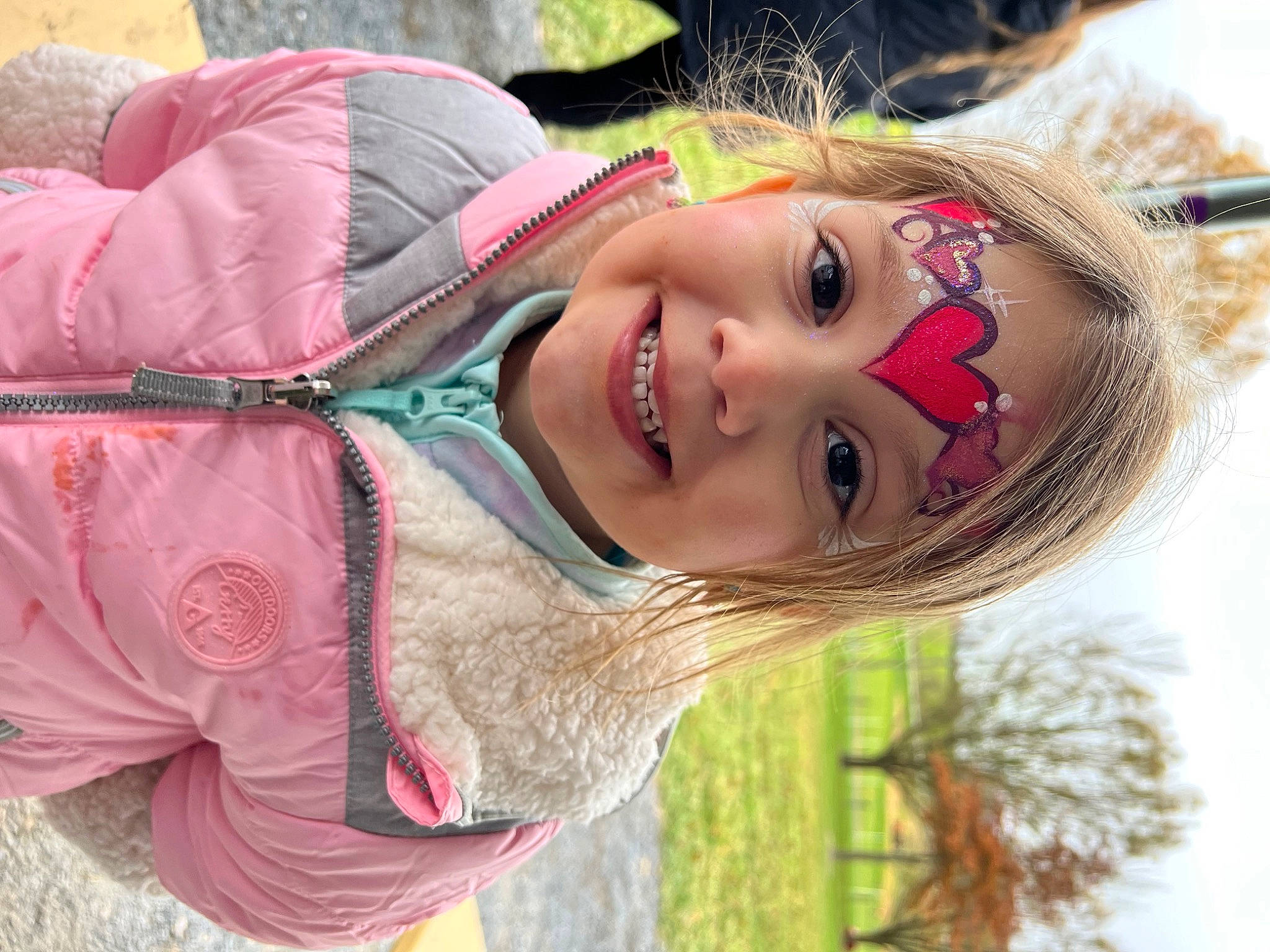 Charlie is registered to the contest to win money with this photo: eye, flash_photography, fun, grass, hair, happy, head, joy, leisure, light, lip, people_in_nature, person, photograph, pink, plant, red, skin, smile, street_fashion