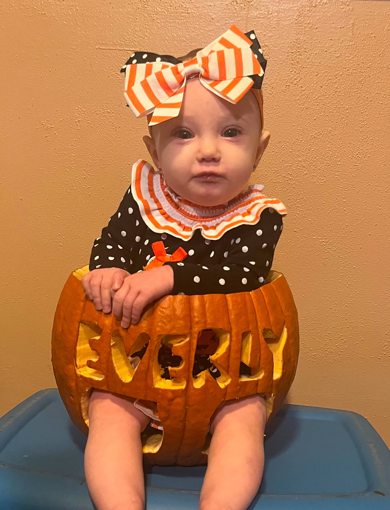 Everly joined the competition — help win amazing prizes! baby, baby_products, baby_toddler_clothing, cap, carmine, chair, child, costume_hat, face, foot, fun, head, headwear, human_body, human_leg, person, personal_protective_equipment, sitting, sleeve, t_shirt