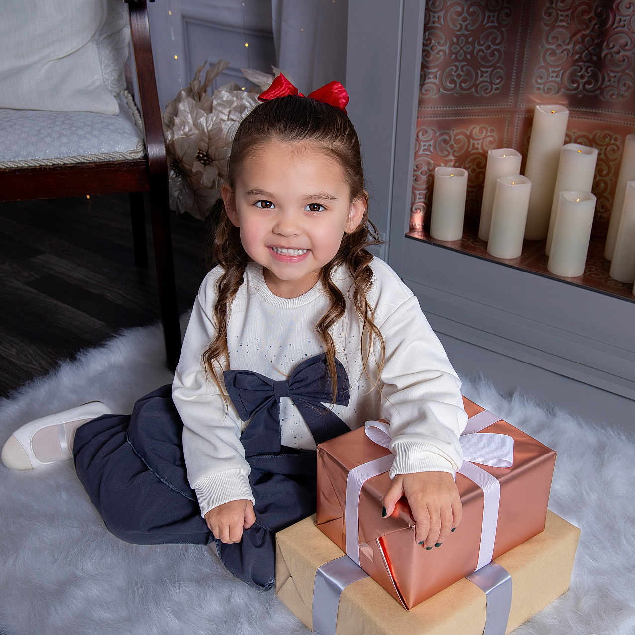 Emelia is registered to the contest to win money with this photo: architecture, bodypart, box, building, candle, cardboard, carton, child, clothing, face, female, finger, footwear, girl, hand, hardwood, head, person, shoe, wood