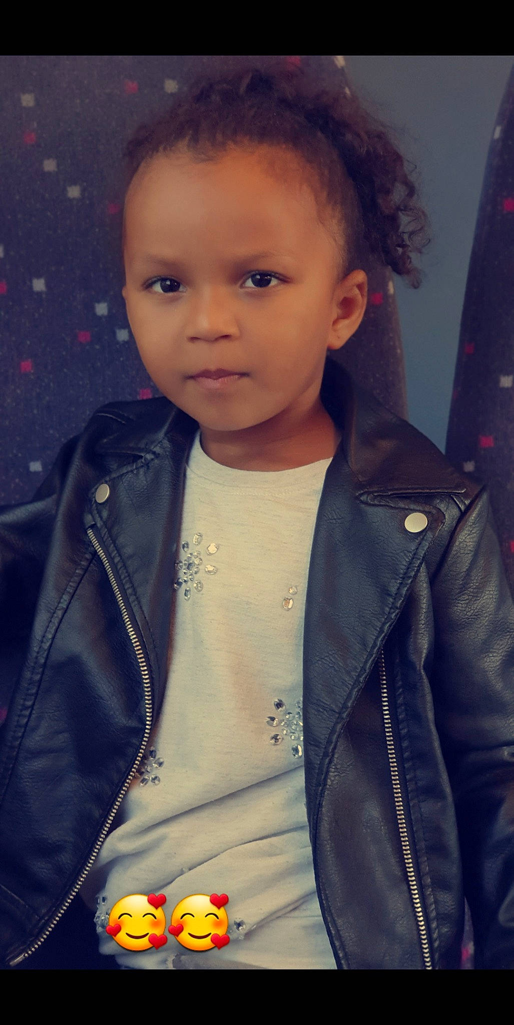 Layana participe au concours pour gagner de l'argent avec cette photo : black_hair, cheek, child, child_model, cool, eyebrow, face, forehead, hair, hairstyle, head, jacket, leather, leather_jacket, lip, nose, outerwear, person, smile, textile