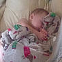 Otis is registered to the contest to win money with this photo: baby, blanket, child, comfort, cozy, cute, holiday_theme, indoor, infant, nap, padded_seat, patterned_blanket, peaceful, portrait, relaxed, resting, sleeping, soft, wrapped, young_child