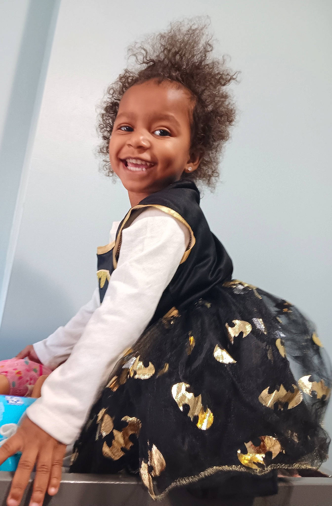 Ella-marie is registered to the contest to win money with this photo: baby_toddler_clothing, child, day_dress, dress, electric_blue, event, fashion_design, flash_photography, formal_wear, happy, jewellery, joy, one_piece_garment, pattern, person, sitting, sleeve, smile, t_shirt, toddler