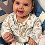 Maylani joined the competition — help win amazing prizes! baby, smiling, cute, onesie, animal_print, floral_print, baby_seat, happy, child, infant, face, hand, clothing, indoor, portrait, young_child, comfort, seatbelt, expression, cute_baby
