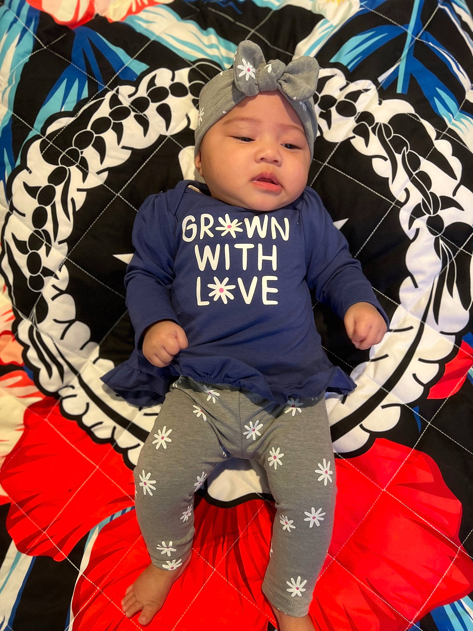 Ca'Leyah is registered to the contest to win money with this photo: automotive_tire, baby, baby_toddler_clothing, black, child, cool, costume_hat, event, fashion_accessory, flash_photography, fun, happy, hat, headgear, headwear, person, photograph, pink, snapshot, style