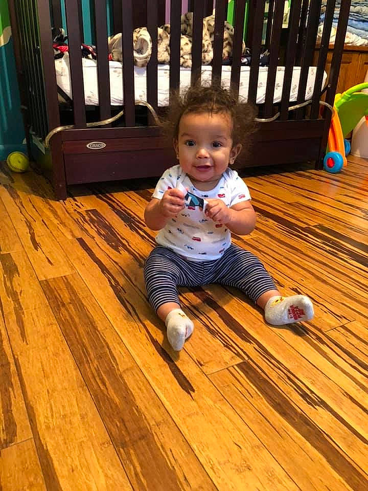 Jayson is registered to the contest to win money with this photo: ball, child, floor, flooring, hardwood, laminate_flooring, person, play, toddler, wood, wood_flooring