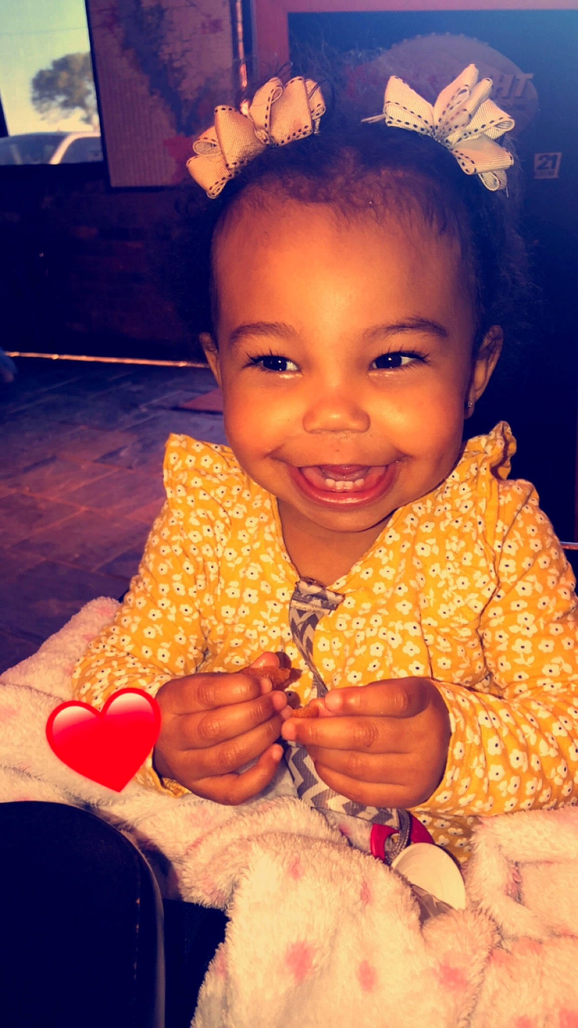 Maliah is registered to the contest to win money with this photo: cheek, child, cuisine, eating, eye, face, facial_expression, finger, food, fun, hairstyle, happy, head, joy, lip, nose, person, skin, smile, thumb