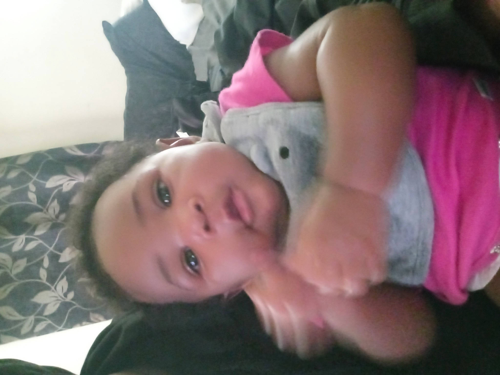 Jakaylah is registered to the contest to win money with this photo: black_hair, cheek, child, comfort, cool, eye, eyelash, fun, fur, grass, happy, joint, lip, mouth, nose, person, shoulder, skin, smile, toddler