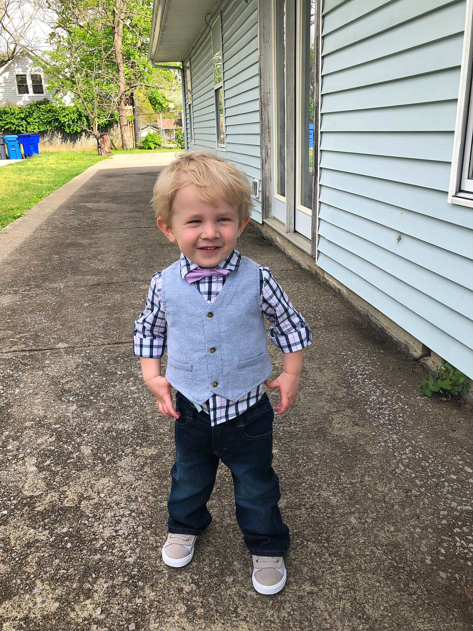 Karson is registered to the contest to win money with this photo: child, denim, footwear, grass, home, jeans, joy, leg, outerwear, people, person, photography, plant, shoe, smile, standing, summer, t_shirt, toddler, tree