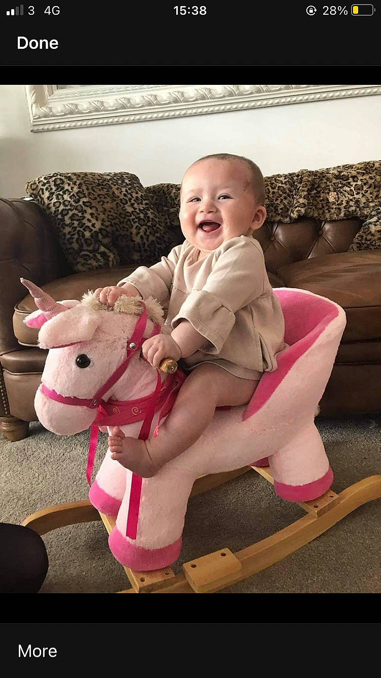 Summer-ellen joined the competition — help win amazing prizes! baby, baby_toddler_clothing, child, comfort, couch, fun, happy, horse, human_leg, knee, lap, leg, magenta, mammal, person, pink, skin, smile, thigh, toddler