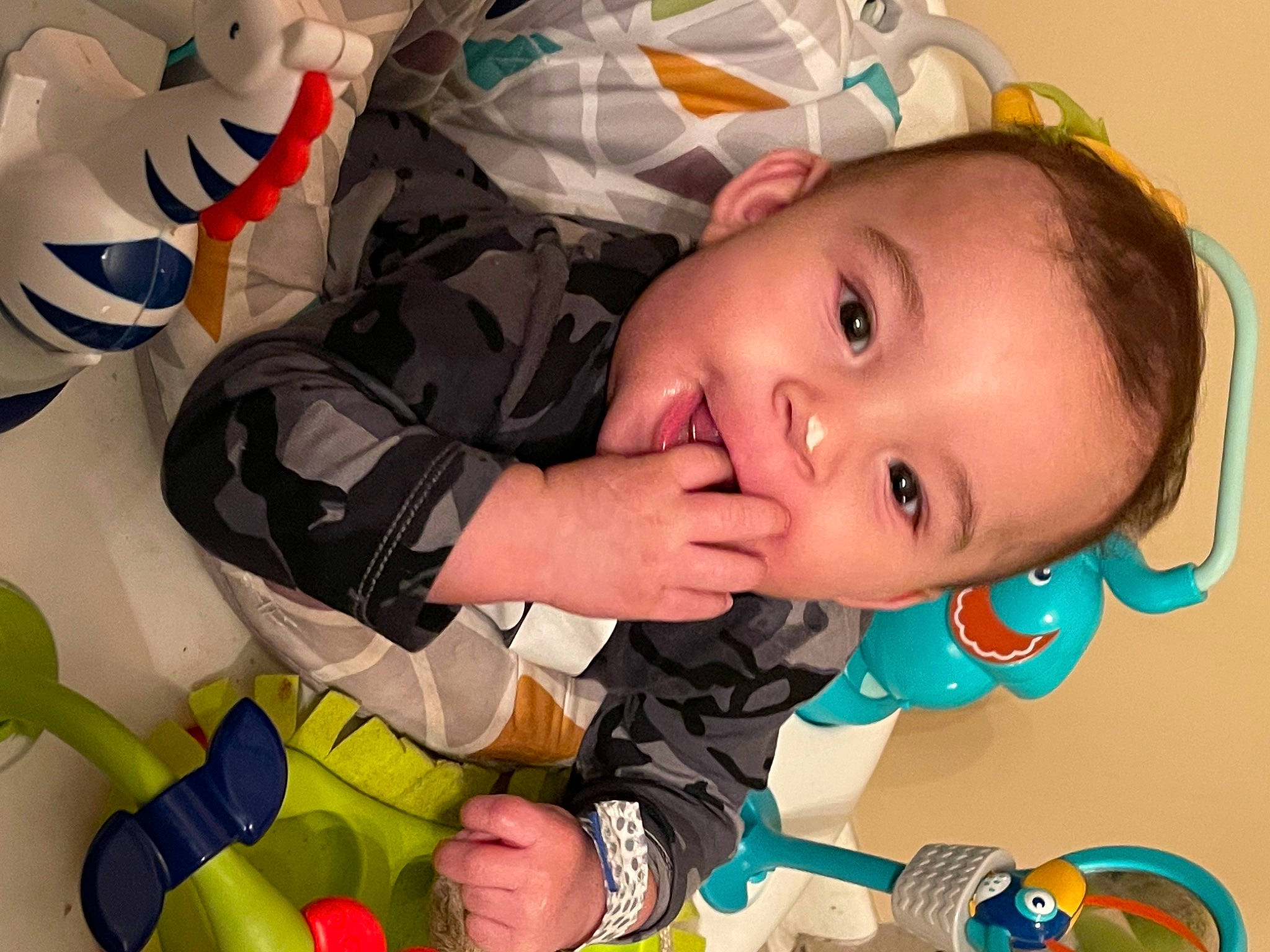 Elijah is registered to the contest to win money with this photo: baby, baby_products, baby_toddler_clothing, baby_toys, cheek, child, eyelash, finger, fun, happy, mouth, nose, pattern, person, play, product, room, skin, toddler, white