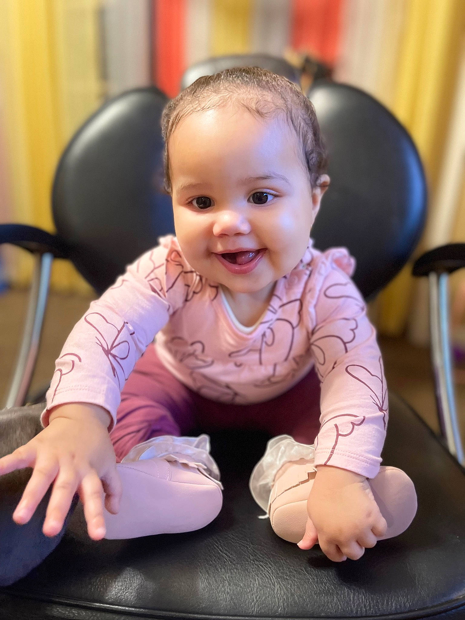 Harleigh joined the competition — help win amazing prizes! arm, baby, baby_toddler_clothing, chair, cheek, child, chin, eye, flash_photography, flooring, fun, happy, joy, mouth, person, sitting, skin, sleeve, smile, thumb