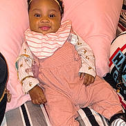 Janiiya is registered to the contest to win money with this photo: baby, bed, blanket, bodypart, clothing, couch, cushion, face, finger, footwear, furniture, glove, hand, head, homedecor, person, photography, portrait, shoe, sneaker