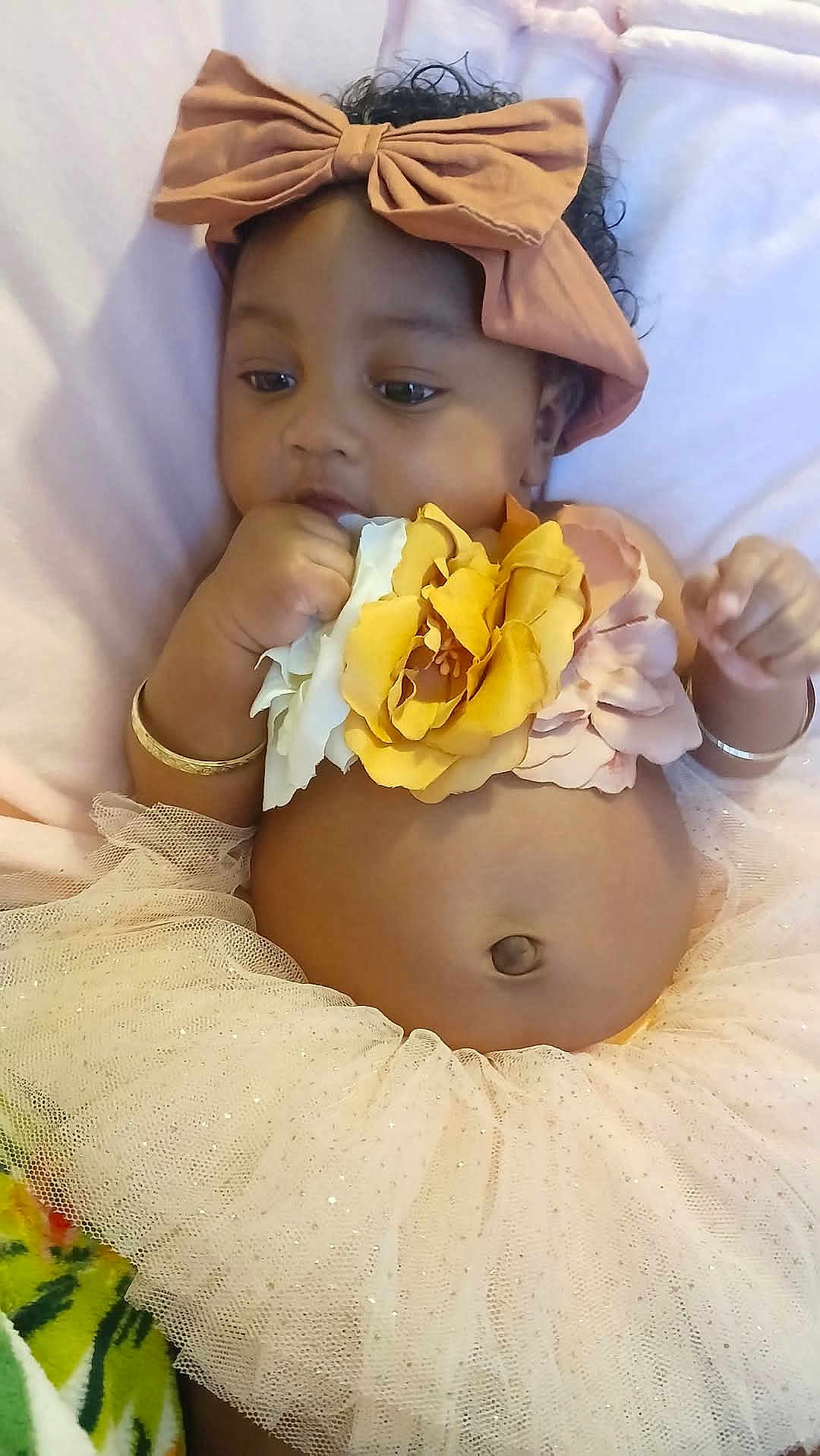 Janiiya joined the competition — help win amazing prizes! accessories, baby, bracelet, clothing, earring, face, flower, happy, head, jewelry, necklace, person, petal, photography, plant, portrait, rose, scarf, sitting, smile