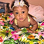 Janiiya is registered to the contest to win money with this photo: accessories, baby, bed, bedroom, blanket, couch, cushion, face, flower, flowerarrangement, furniture, head, homedecor, indoors, person, photography, plant, portrait, quilt, room