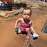 Celeste is registered to the contest to win money with this photo: toddler, child, water_play, swimsuit, water_fountain, toy, outdoor, sunny, rock, barrel, splash, play, summer, fun, water, person, young_child, daylight, recreation, nature