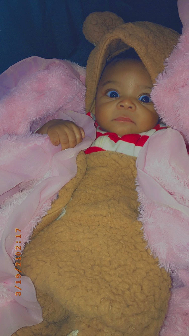 Zaniyah is registered to the contest to win money with this photo: baby, baby_toddler_clothing, beauty, cheek, chin, comfort, eye, fur_clothing, headgear, iris, linens, lip, nose, outerwear, person, pink, skin, stuffed_toy, textile, toddler