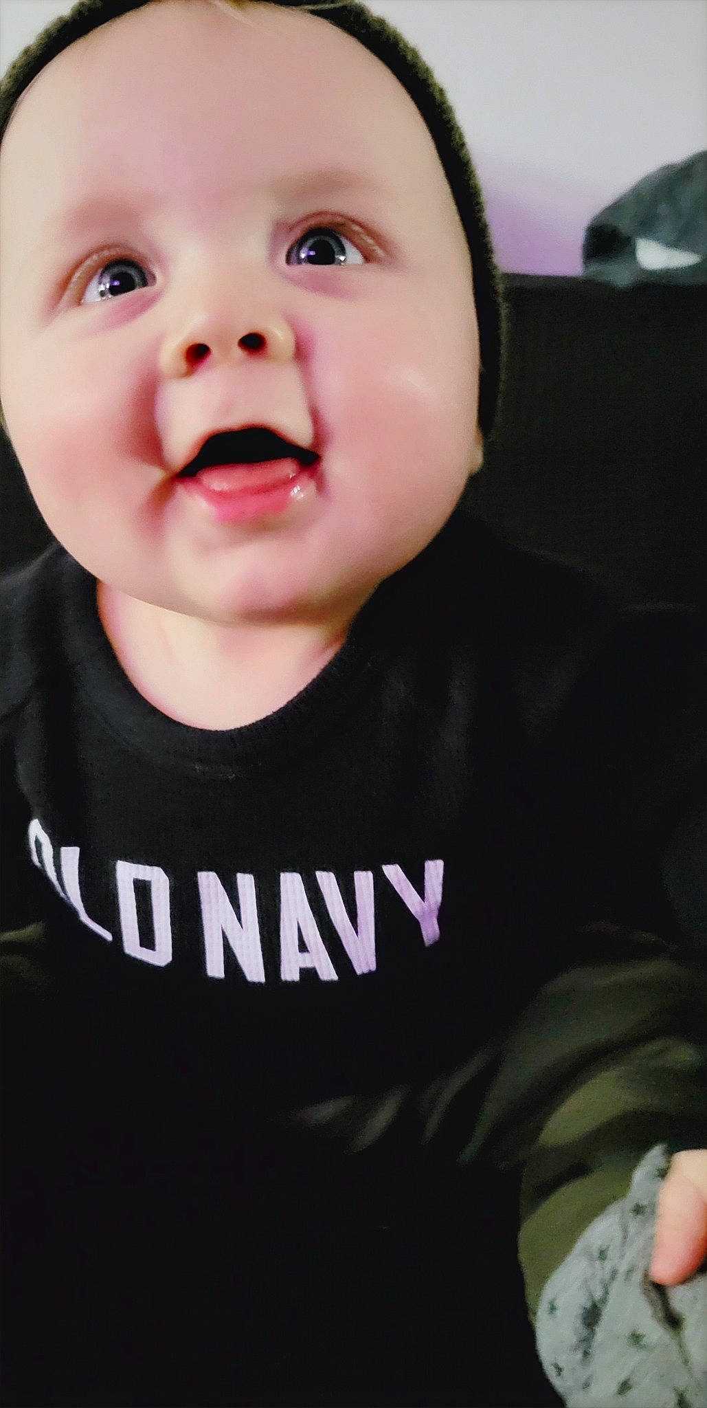 Colter is registered to the contest to win money with this photo: baby, baby_toddler_clothing, cheek, chin, eyebrow, eyelash, flash_photography, gesture, happy, jaw, mouth, neck, nose, outerwear, person, sleeve, smile, t_shirt, toddler, tongue