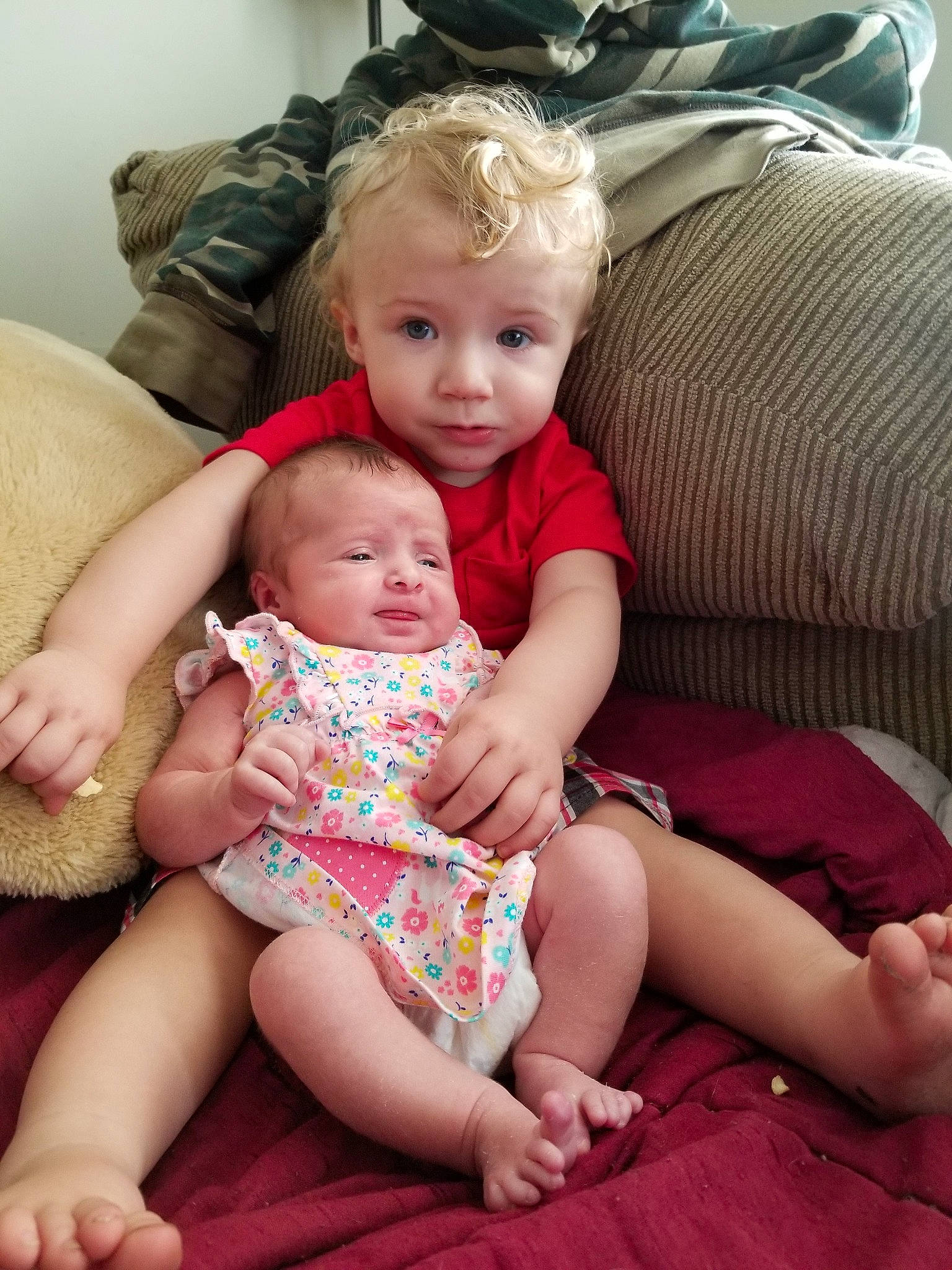 Jojo joined the competition — help win amazing prizes! baby, cheek, child, daughter, finger, lap, leg, person, sibling, sitting, skin, toddler