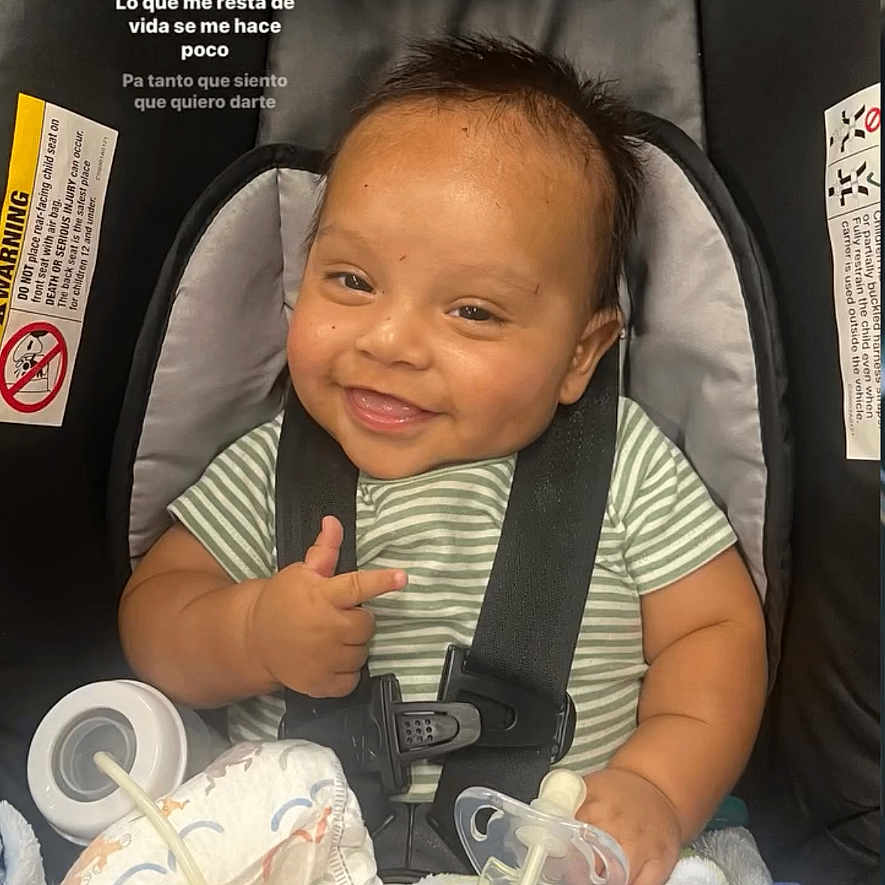 Zoriann joined the competition — help win amazing prizes! baby, child, car_seat, smiling, pacifier, blanket, hand, infant, clothing, person, seatbelt, indoor, cute, happy, portrait, baby_toy, comfortable, young_child, sitting, car_seat_harness