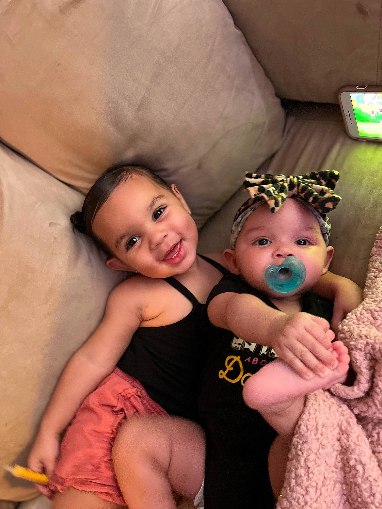 Maliyah is registered to the contest to win money with this photo: baby, baby_toddler_clothing, child, comfort, dress, event, face, fashion_accessory, flash_photography, fun, happy, headband, headpiece, iris, joy, person, pink, room, skin, smile