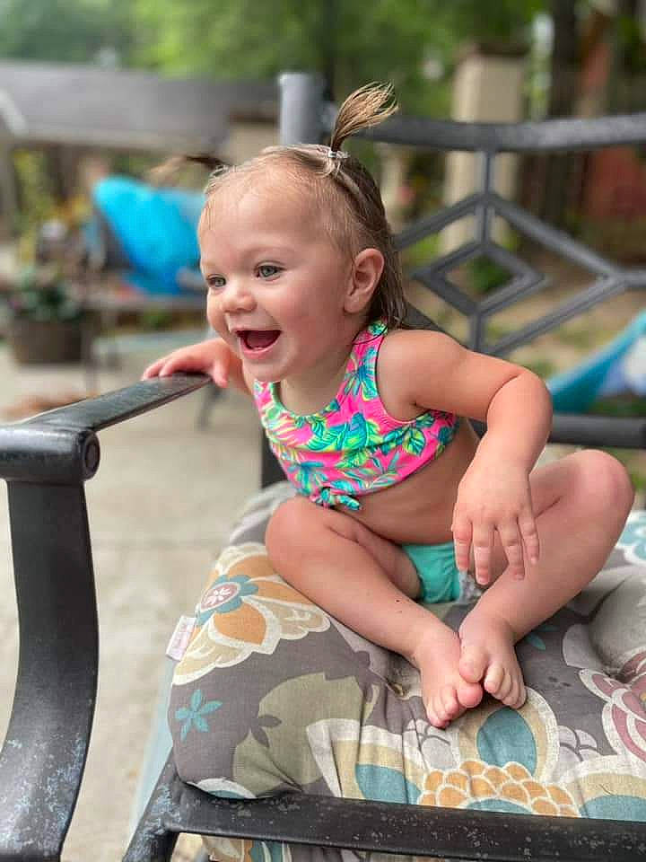 Caroline joined the competition — help win amazing prizes! barefoot, child, event, fun, grass, happy, jewellery, leisure, party, person, play, public_event, recreation, sitting, smile, street, summer, thigh, toddler, tourism