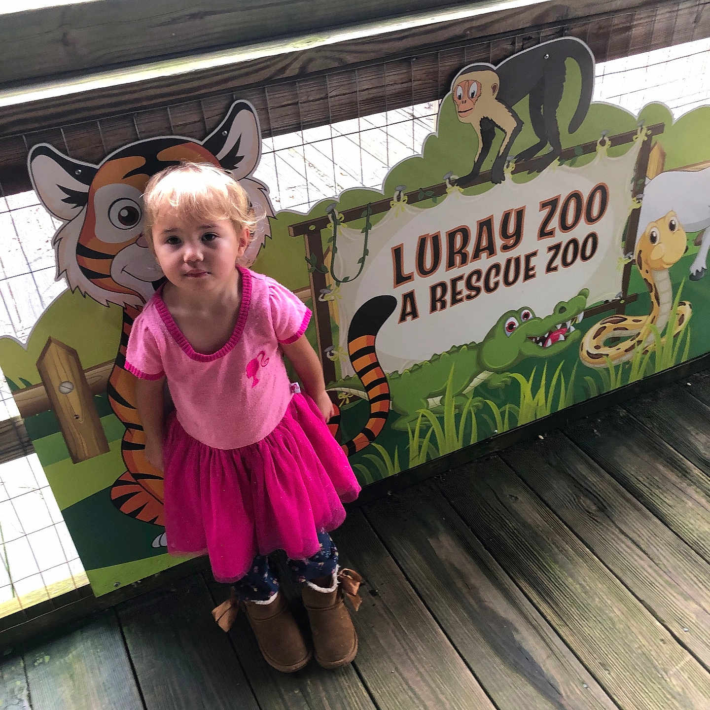 Alyvia is registered to the contest to win money with this photo: child, clothing, costume, cream, dessert, dress, face, female, food, footwear, girl, head, pants, person, photography, portrait, sandal, shoe, shorts, wood